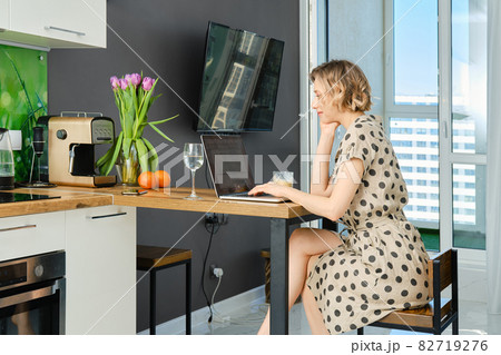 Woman contacting client by conference, talking on webcam, online consultation Woman contacting client by conference, talking on webcam, online consultation 82719276