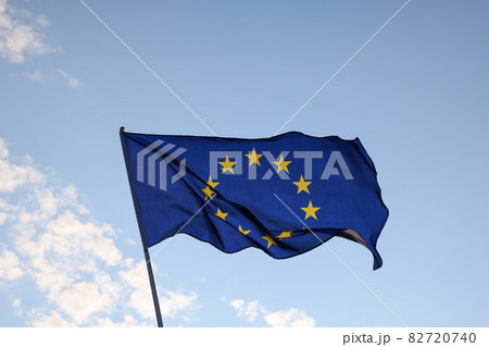 European Union EU flag waving in clear blue sky 82720740