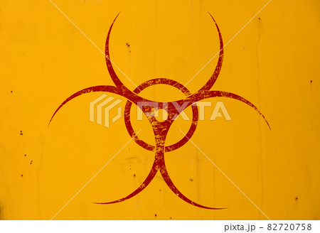 Red biohazard sign over yellow background 82720758