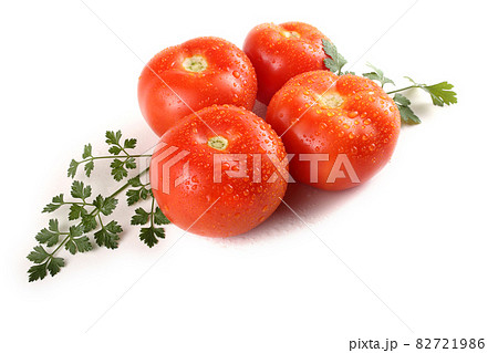 Red tomatoes and parsley 82721986