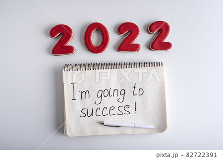 Numbers 2022 and notebook with the words I am going to success. Motivation for 2022. 82722391