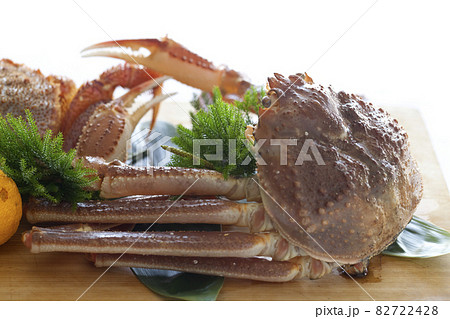 Fresh hairy crab on a wooden plate and white background. Fresh hairy crab on a wooden plate and white background. 82722428