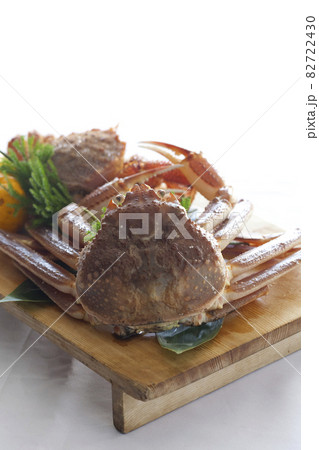 Fresh hairy crab on a wooden plate and white background. Fresh hairy crab on a wooden plate and white background. 82722430