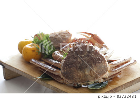Fresh hairy crab on a wooden plate and white background. Fresh hairy crab on a wooden plate and white background. 82722431