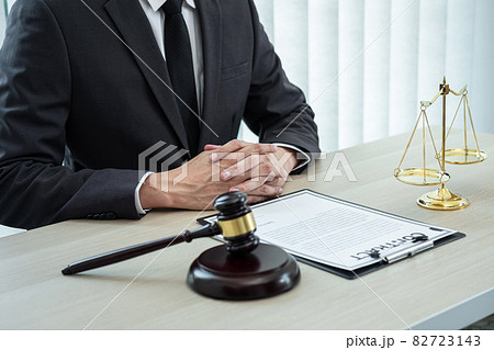Male lawyer working with legal case document contract in office, law and justice, attorney, lawsuit concept 82723143