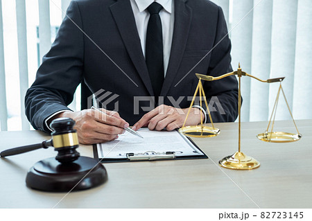 Male lawyer working with legal case document contract in office, law and justice, attorney, lawsuit concept Male lawyer working with legal case document contract in office, law and justice, attorney, lawsuit concept 82723145