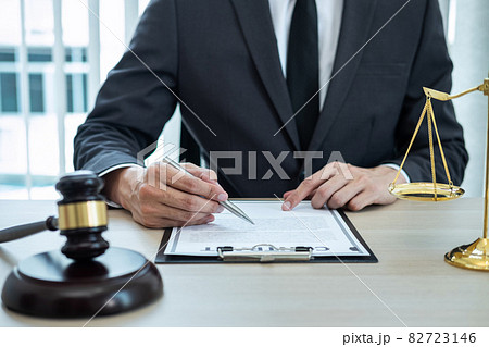 Male lawyer working with legal case document contract in office, law and justice, attorney, lawsuit concept Male lawyer working with legal case document contract in office, law and justice, attorney, lawsuit concept 82723146