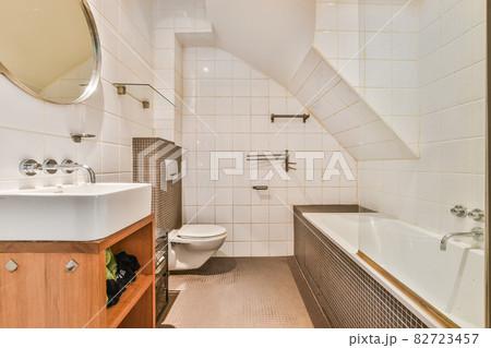 Luxury interior design of a bathroom with marble walls 82723457
