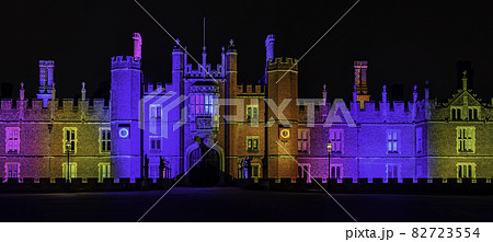 Illuminated Hampton Court Palace by night 82723554