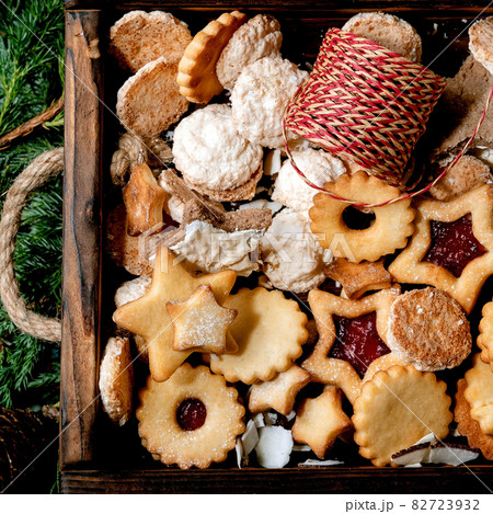 Christmas Homemade shortbread biscuits cookies collection on thuja branches. Top view Christmas Homemade shortbread biscuits cookies collection on thuja branches. Top view 82723932