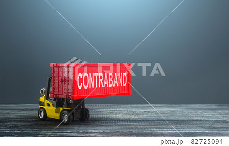 A forklift truck carries a red container contraband. Transportation of illegal prohibited goods. Border control, high corruption level. Drugs, alcohol and cigarettes smuggling. Damage to the economy. A forklift truck carries a red container contraband. Transportation of illegal prohibited goods. Border control, high corruption level. Drugs, alcohol and cigarettes smuggling. Damage to the economy. 82725094