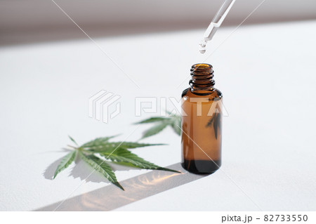 Medical Marijuana Cannabis Cbd Oil, THC tincture and hemp leaves, Herbal Treatment, Alternative Medicine. herbs for calmness and anxiety reduction 82733550