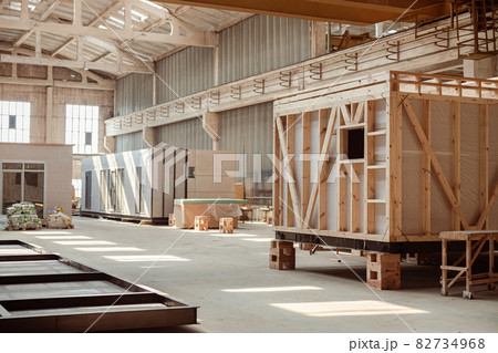 Building under construction with prefabricated containers and cabins Building under construction with prefabricated containers and cabins 82734968