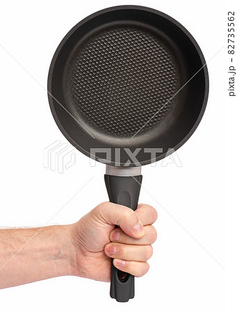 Hand with frying pan Hand with frying pan 82735562