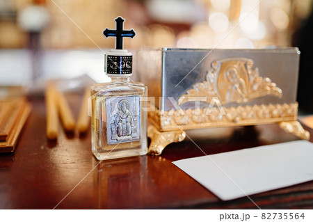 In Christianity, specially prepared and consecrated aromatic oil In Christianity, specially prepared and consecrated aromatic oil 82735564