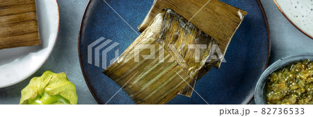 Tamales overhead flat lay panorama. Traditional dish of Mexican cuisine 82736533
