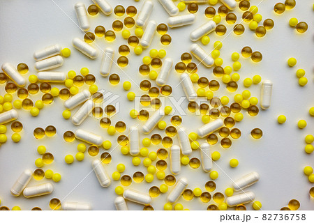 biologically active additives in the form of capsules and pills on a white background 82736758