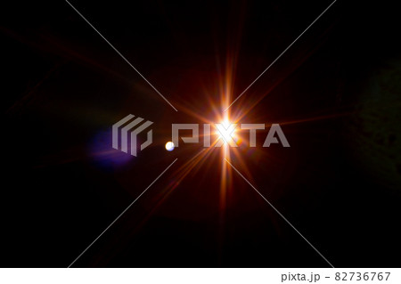 Sun flare on the black background 82736767