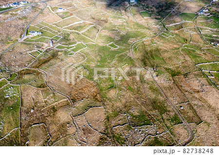 Aerial view of fields and dry stone walls in Gweedore - County Donegal, Ireland Aerial view of fields and dry stone walls in Gweedore - County Donegal, Ireland 82738248