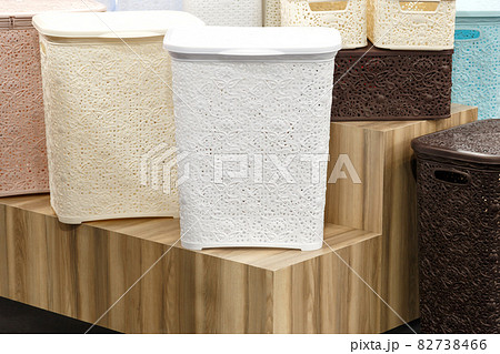 Assortment of different new empty plastic laundry baskets several. Variation of household goods Assortment of different new empty plastic laundry baskets several. Variation of household goods 82738466