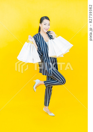 Portrait beautiful young asian woman smile with shopping bag 82739362