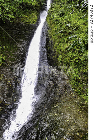 Whitelady waterfall in rain - Lydford Gorge, Dartmoor National Park, Devon, United Kingdom 82740332