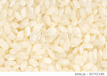 Uncooked rice background texture. Full frame Uncooked rice background texture. Full frame 82742180
