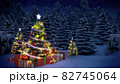shiny Christmas tree before snow covered forest at night 82745064