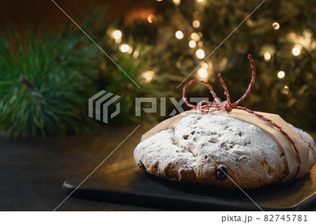 Christmas stollen - traditional German bread on brown. Christmas stollen - traditional German bread on brown. 82745781