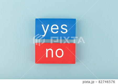 Yes and no written on blue and red rectangles. Concept of positive and negative answer 82746576