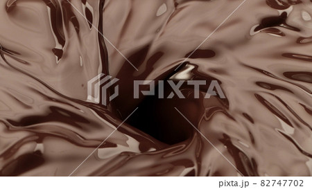 Macro photo of premium dark chocolate splashing. 82747702