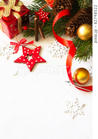 Christmas, new year concept background. Xmas composition. Branches of spruce, present and red decorations. Copy space. Christmas, new year concept background. Xmas composition. Branches of spruce, present and red decorations. Copy space. 82748522