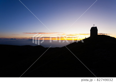 Dawn at the little church, mount Grappa landscape, Italy 82749032