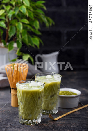 Cold matcha tea with milk and ice Cold matcha tea with milk and ice 82752606