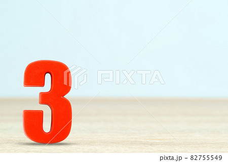 Shot of a number three made of red plastic 82755549