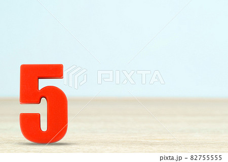 Shot of a number five made of red plastic 82755555