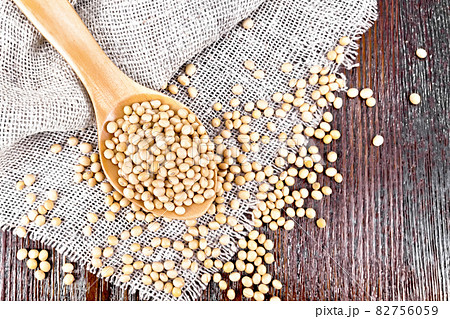 Soybeans in spoon on board top Soybeans in spoon on board top 82756059