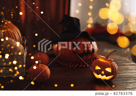 Ready halloween pumpkins with faces and hat 82763376