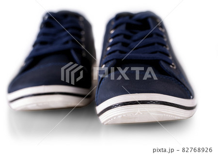 blue men's summer sneakers isolated on white. Selective focus 82768926