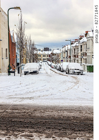 street winter cityscape with snow terraced houses and frozen cars street winter cityscape with snow terraced houses and frozen cars 82771845