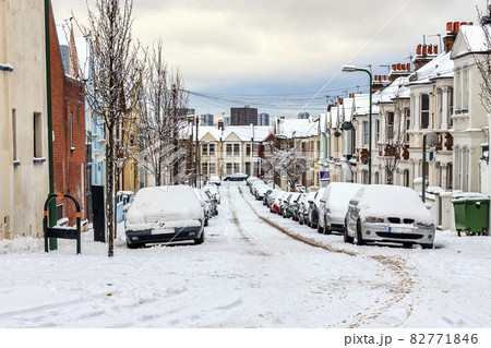 street winter cityscape with snow terraced houses and frozen cars street winter cityscape with snow terraced houses and frozen cars 82771846