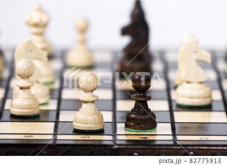 Two Chess Pawn Standing next to each other, Making Decision and Take a Strategy, Hobby that Stimulates Brain Activity, Copy Space Two Chess Pawn Standing next to each other, Making Decision and Take a Strategy, Hobby that Stimulates Brain Activity, Copy Space 82775913