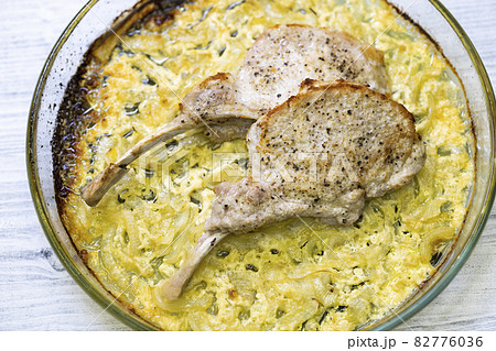 seared pork chop roasted on creamy onion seared pork chop roasted on creamy onion 82776036