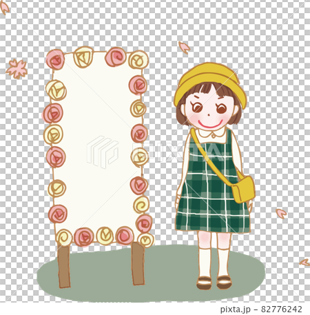 一個女孩站在一個標誌旁邊。 82776242