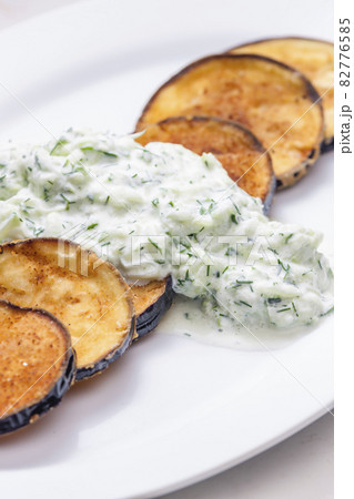 Greek tzaziki salad with fried aubergin 82776585