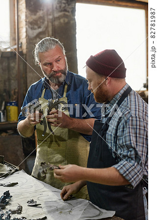 Man making details from metal Man making details from metal 82781987