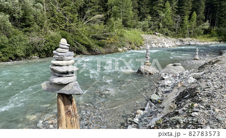 wanderpath in the rocks near a wild river wanderpath in the rocks near a wild river 82783573