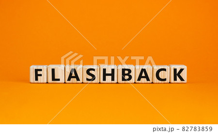 Wooden cubes with word 'flashback'. Beautiful orange background. Business and educational concept. Copy space. Wooden cubes with word 'flashback'. Beautiful orange background. Business and educational concept. Copy space. 82783859