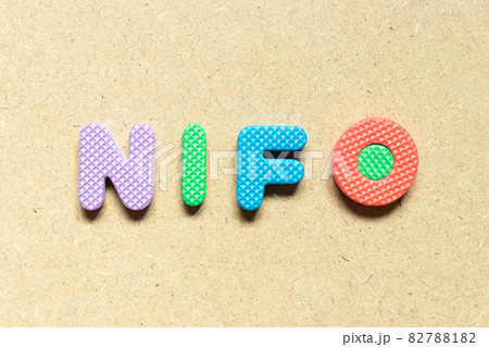 Foam alphabet letter in word NIFO (abbreviation of next in first out) on wood background Foam alphabet letter in word NIFO (abbreviation of next in first out) on wood background 82788182