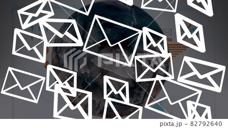 Composition of network of email envelope icons over globe in background Composition of network of email envelope icons over globe in background 82792640